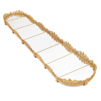 View full screen - View 1 of Lot 92. AN EMPIRE STYLE GILT-BRONZE SURTOUT DE TABLE, IN THE MANNER OF PIERRE-PHILIPPE THOMIRE.