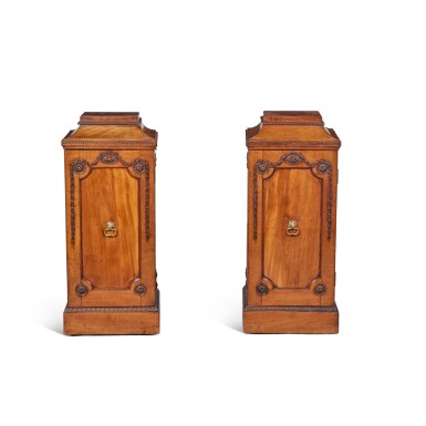 View full screen - View 1 of Lot 137. A Pair of George III Carved Mahogany Pedestal Cabinets, Late 18th Century.