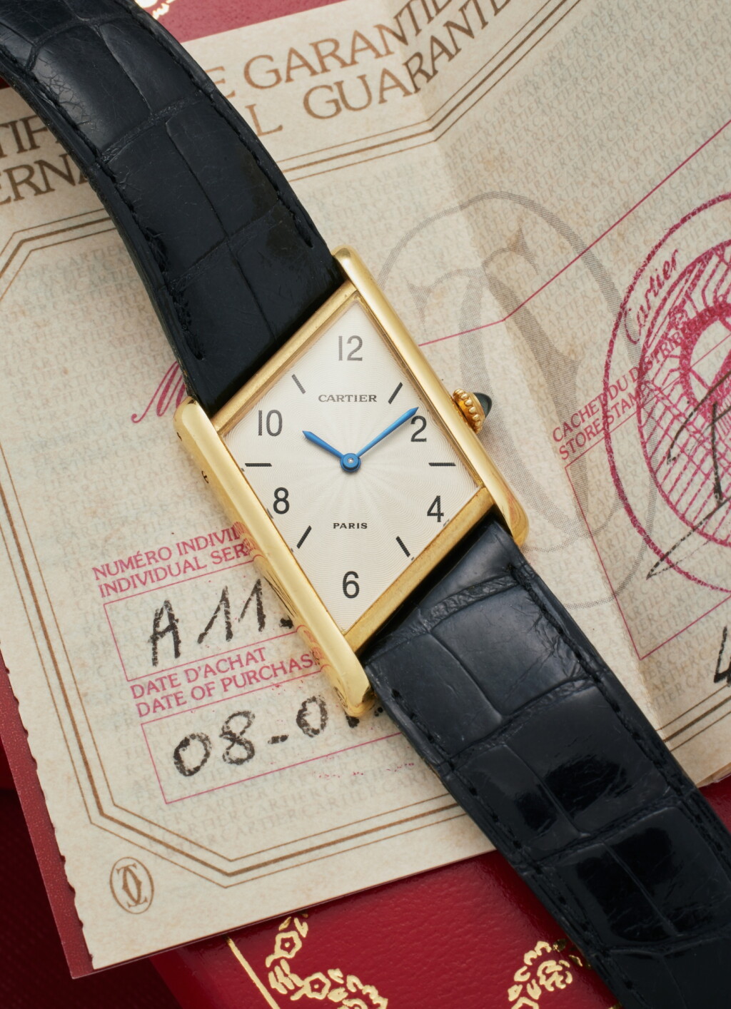 View full screen - View 1 of Lot 70. Reference 2488 Tank Asymétrique | A limited edition yellow gold asymmetric wristwatch with Paris dial, Circa 1996.