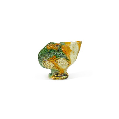 View full screen - View 1 of Lot 129. A sancai pottery duck-form libation cup, Tang dynasty | 唐 三彩寳鴨形盃.