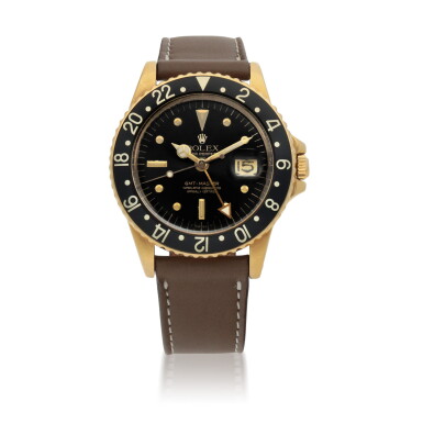 View full screen - View 1 of Lot 408. ROLEX | GMT-MASTER, REF 1675, YELLOW GOLD DUAL TIME WRISTWATCH WITH DATE CIRCA 1977.