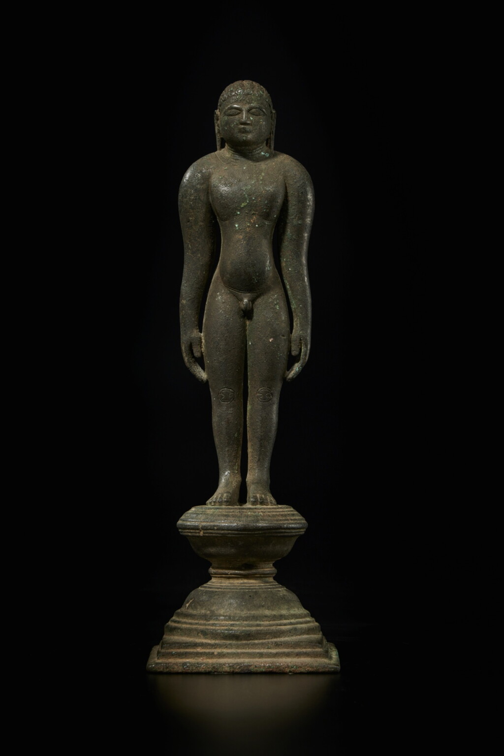 View full screen - View 1 of Lot 821. A bronze figure of a tirthankara, India, Tamil Nadu, 11th century.