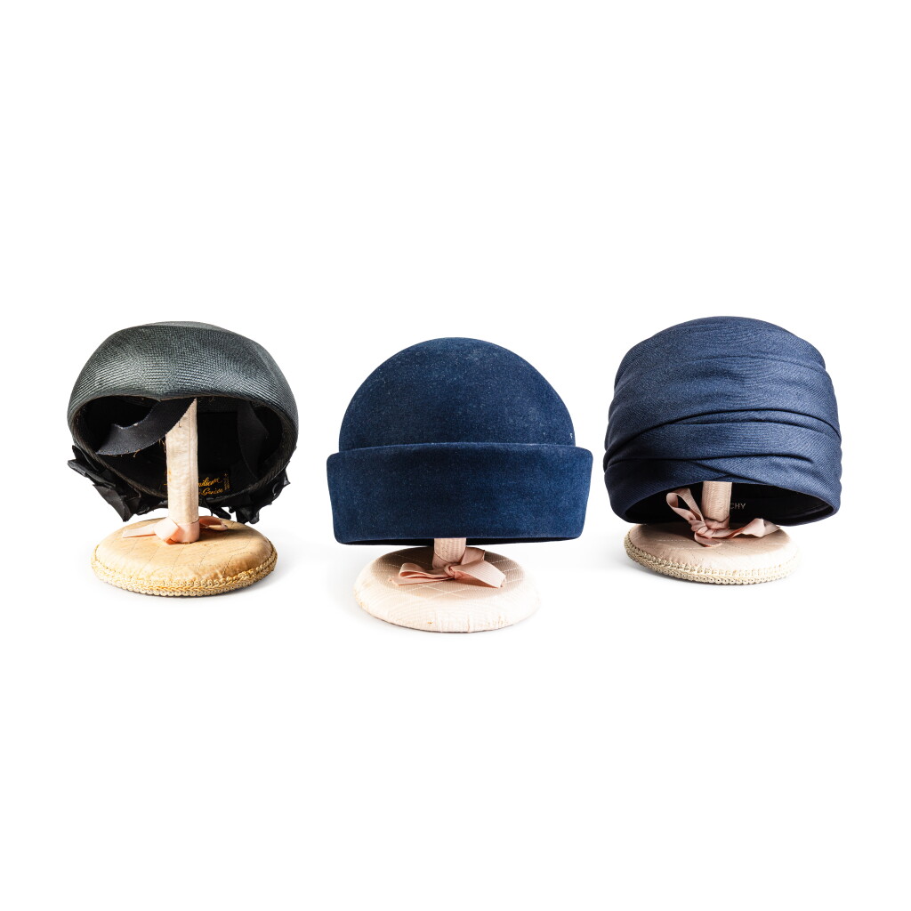 View full screen - View 1 of Lot 278. Three Hats with Hat Holders: one Givenchy navy silk hat, one Givenchy navy wool hat and one Simone Emilienne black wicker hat.