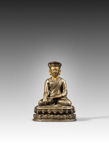View full screen - View 1 of Lot 111. An inscribed silver alloy figure of Jigten Sumgon Rinchen Pel, Tibet, 17th century.