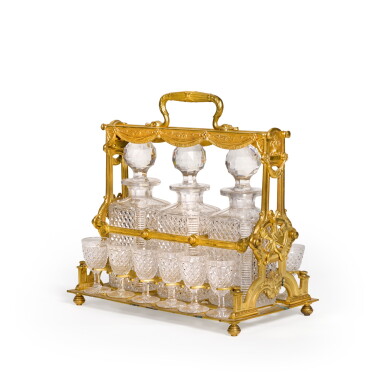 View full screen - View 1 of Lot 106. A FRENCH GILT-METAL AND CUT-GLASS TANTALUS, LATE 19TH CENTURY.