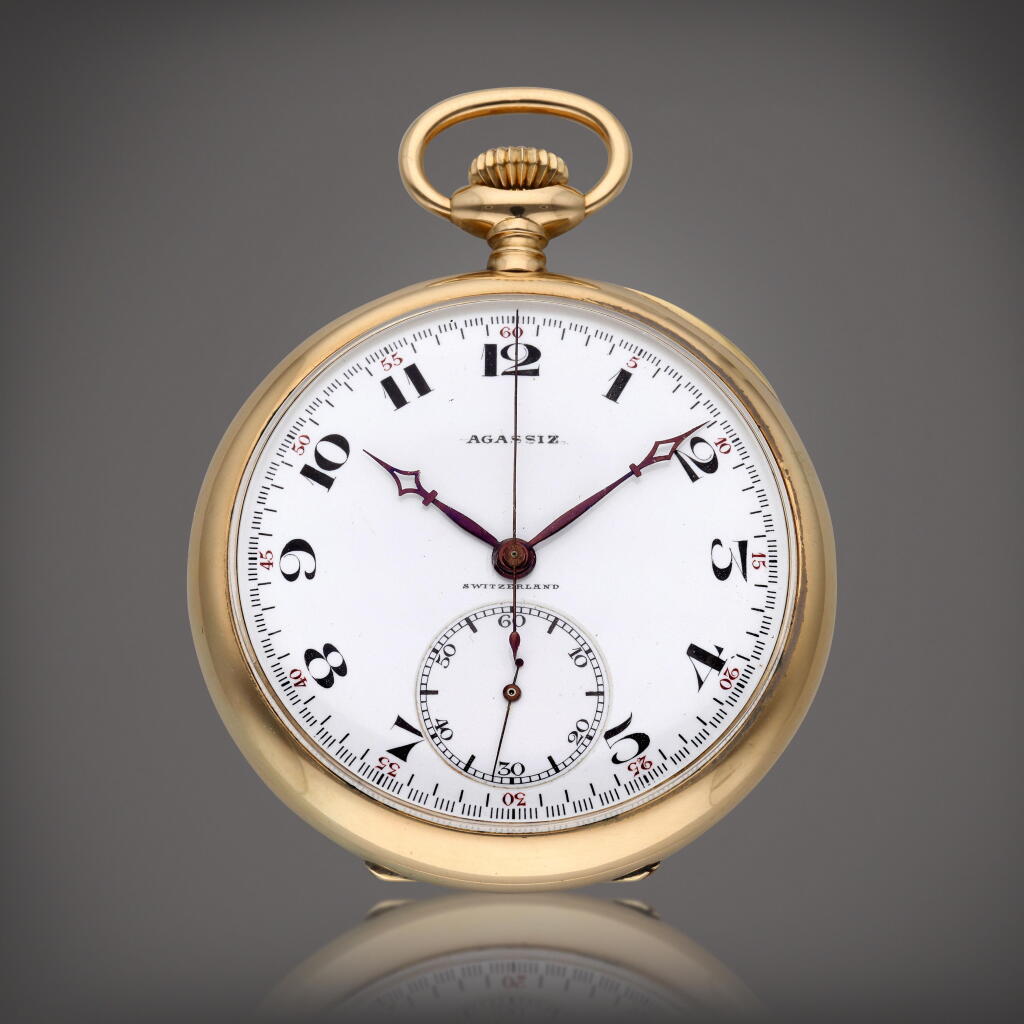 View full screen - View 1 of Lot 313. Retailed by Tiffany & Co.: A yellow gold open faced chronograph watch, inscribed for famed aviator Wiley Post, Circa 1930.