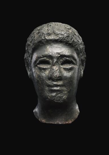 View full screen - View 1 of Lot 55. AN EGYPTIAN BASALT HEAD OF A MAN, LATE PTOLEMAIC PERIOD, CIRCA 100-30 B.C..