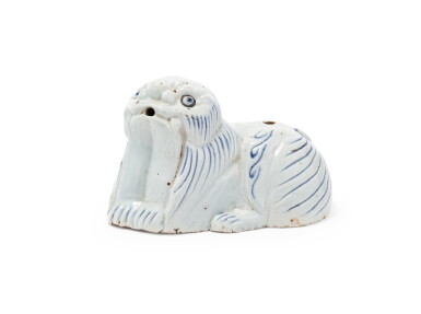 View full screen - View 1 of Lot 34. A small blue and white 'dog' waterdropper, Korea, Joseon dynasty | 朝鮮王國 青花臥犬水滴.