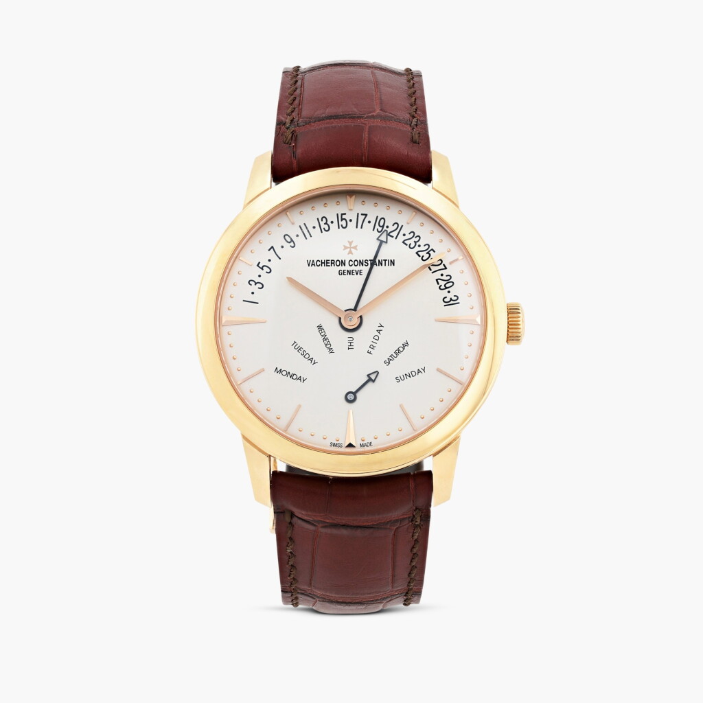 View full screen - View 1 of Lot 403. Patrimony, reference 86020, pink gold wristwatch with retrograde day and date, circa 2014.