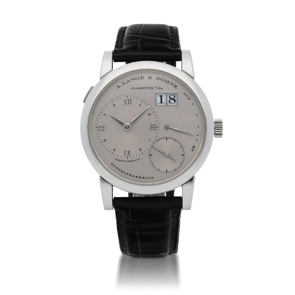 View full screen - View 1 of Lot 7. LANGE 1, REF 101.025 PLATINUM WRISTWATCH WITH DIGITAL DATE DISPLAY AND POWER RESERVE INDICATION CIRCA 2003.