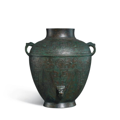View full screen - View 1 of Lot 705. An inscribed bronze ritual wine vessel, lei, Late Shang dynasty | 商晚期 青銅獸面紋得罍.