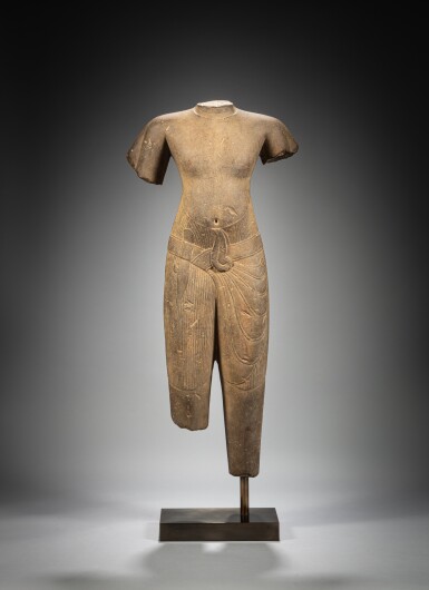 View full screen - View 1 of Lot 162. A sandstone male deity, Cambodia, Angkor period, 11th century | 高棉 吳哥王朝十一世紀 砂岩雕神立像殘件.