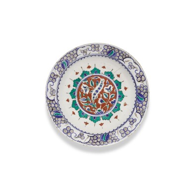 View full screen - View 1 of Lot 214. An Iznik polychrome pottery dish, Turkey, circa 1585.
