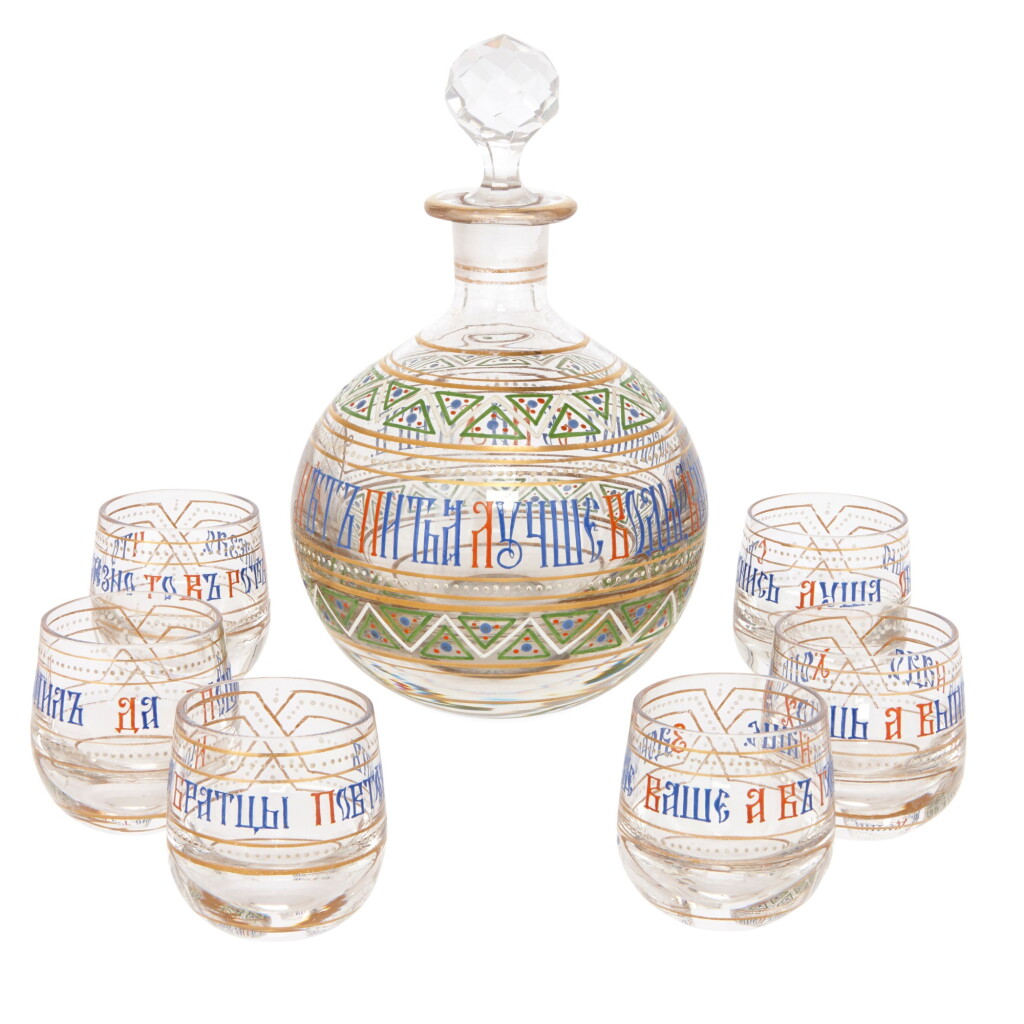 View full screen - View 1 of Lot 104. A RUSSIAN ENAMELLED AND GILT GLASS VODKA DRINKING SET, LATE 19TH CENTURY.