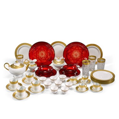 View full screen - View 1 of Lot 1. An extensive Limoges porcelain tea, coffee and dessert service, a set of water glasses, a moulded ruby glass fruit service and a large set of white and gilt tea bowls, 20th century, various makers.