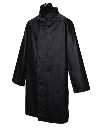 View full screen - View 1 of Lot 10. GEORGE HARRISON | Black JelTek raincoat, three-quarter length.