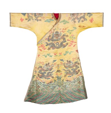 View full screen - View 1 of Lot 179. A yellow-ground winter 'dragon' robe, jifu Qing dynasty, 18th century | 清十八世紀 明黃地織龍紋藏袍.