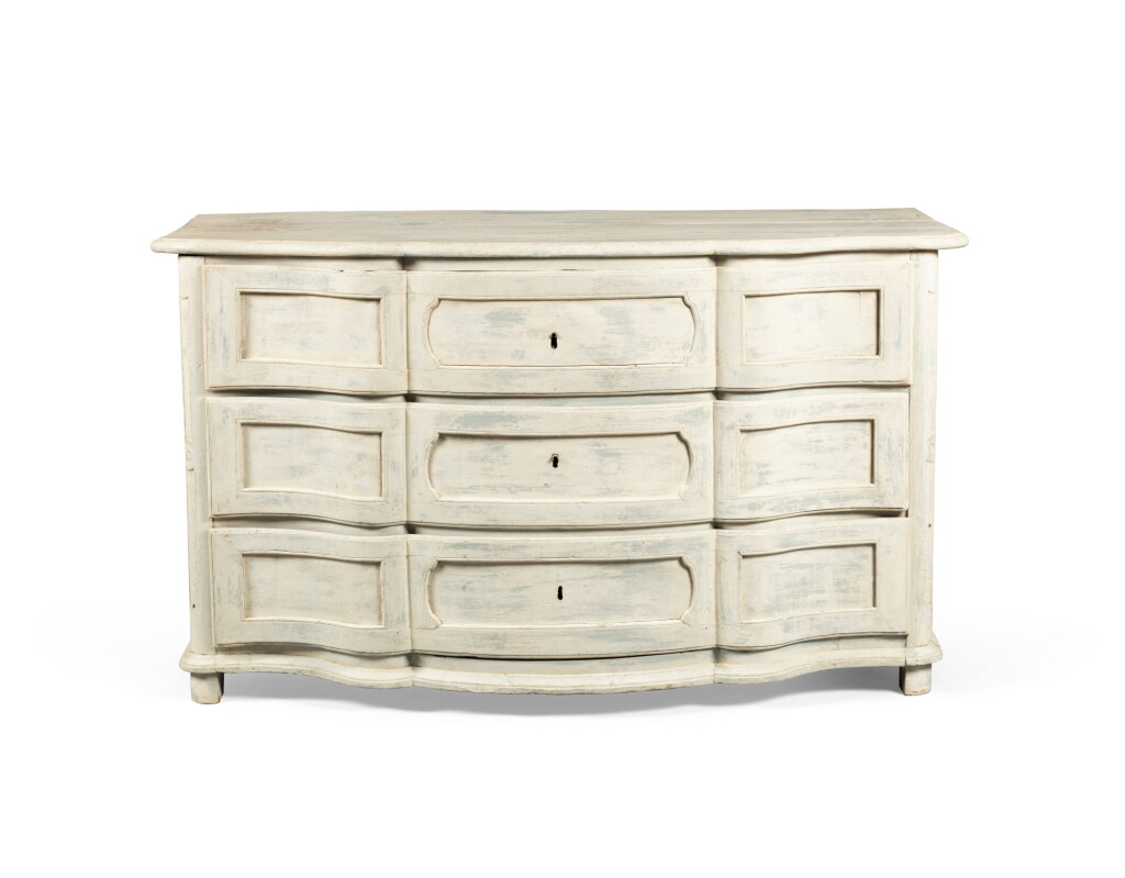 View full screen - View 1 of Lot 50. A Louis XV provincial painted walnut commode, third quarter 18th century | Commode en arbalète en noyer peint et sculpté, travail provençal d’époque Louis XV, troisième quart du XVIIIe siècle.