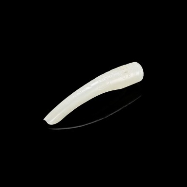 View full screen - View 1 of Lot 3042. A white jade 'bat and coin' nail guard, Qing dynasty, 19th century 清十九世紀 白玉福在眼前護甲.