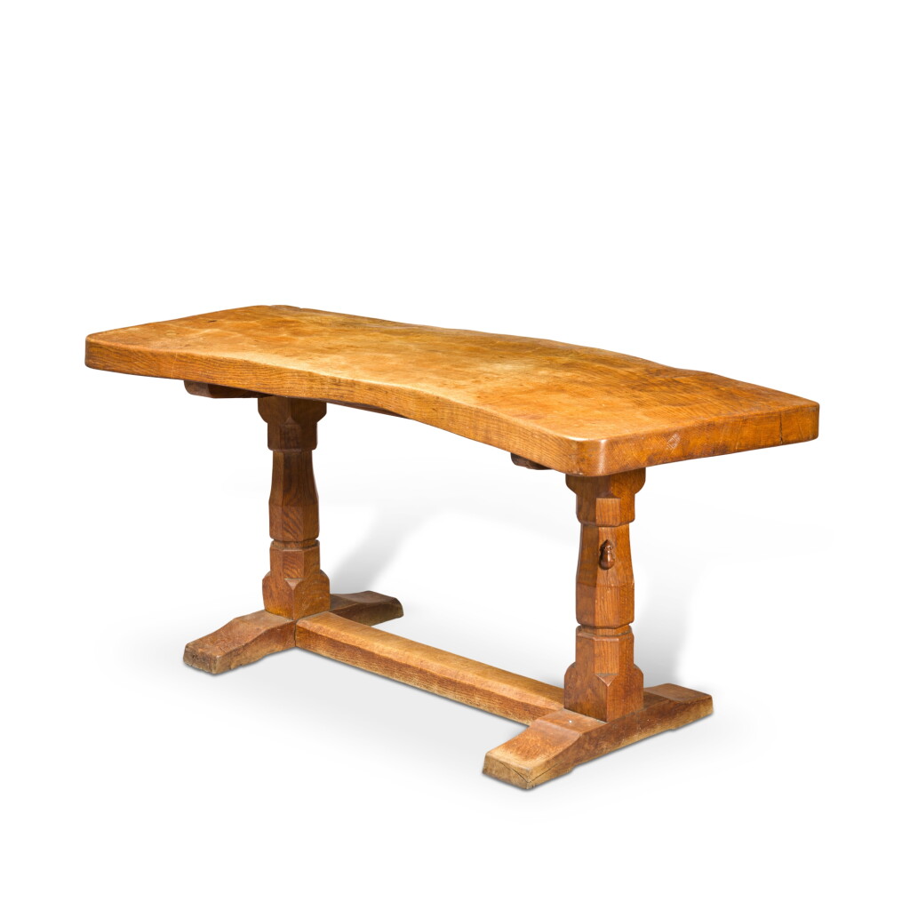 View full screen - View 1 of Lot 169. A late Arts and Crafts oak desk by Robert 'Mouseman' Thompson, second quarter 20th century.