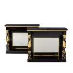 A pair of Austrian ebonized and parcel-gilt console tables, first quarter 19th century