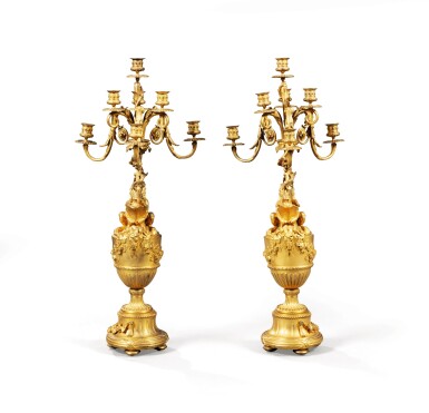 View full screen - View 1 of Lot 124. A pair of gilt-bronze ewer-shaped seven-light candelabra,.