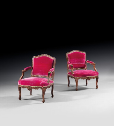 View full screen - View 1 of Lot 32. A pair of beechwood and walnut armchairs, French Régence, circa 1720 | Paire de fauteuils à dossier plat en hêtre et noyer d'époque Régence, vers 1720.