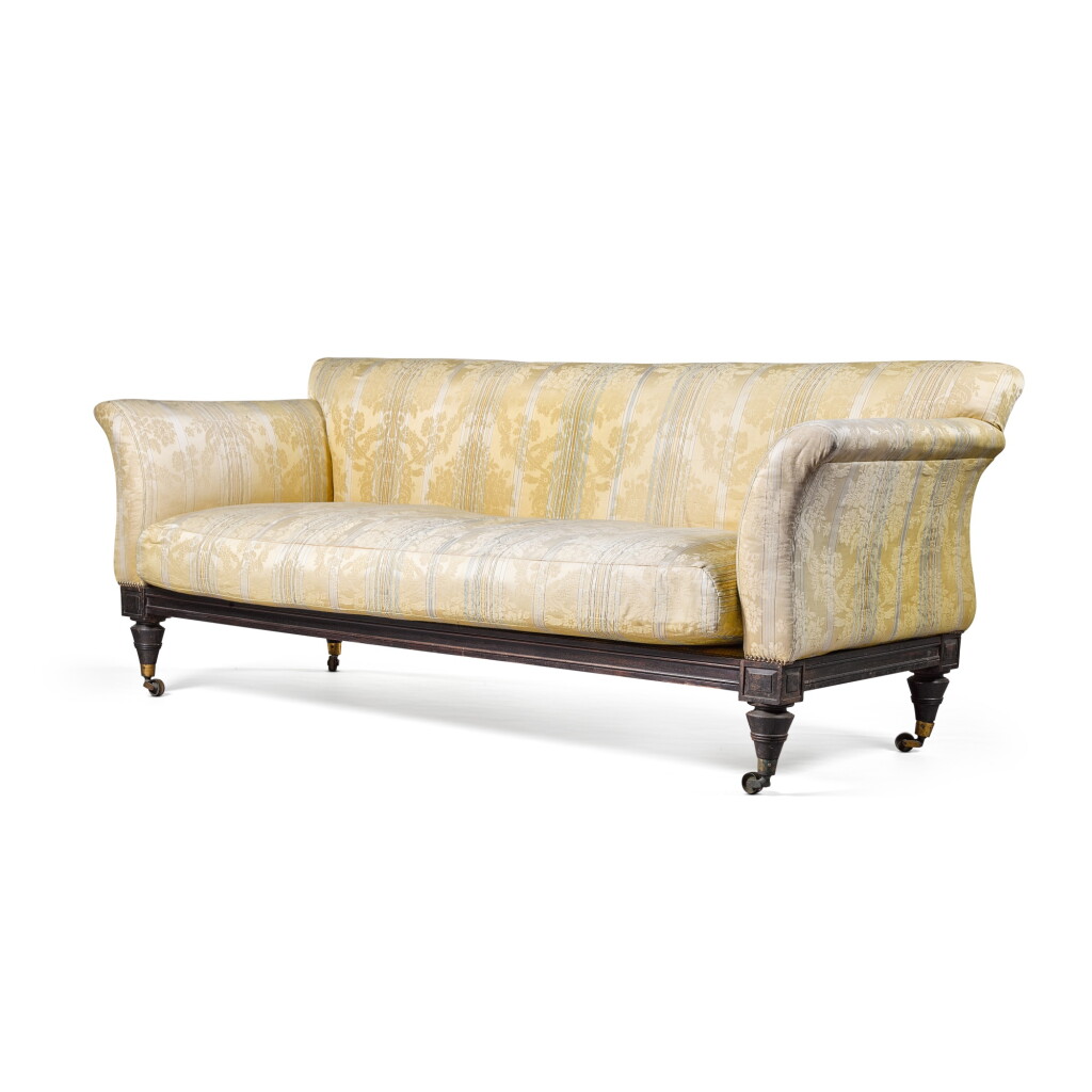 View full screen - View 1 of Lot 161. A mahogany and upholstered sofa, incorporating 19th-century elements.