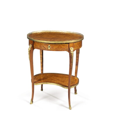 View full screen - View 1 of Lot 173. A Transition gilt-bronze-mounted holly and tulipwood parquetry table à écrire.