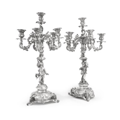 View full screen - View 1 of Lot 410. A pair of German Rococo style silver figural six-light candelabra, Bruckman & Sohne, Heilbronn, circa 1870 | Paire de chandeliers à 6 lumières en argent de style rococo par Bruckman & Sohne, Heilbronn, vers 1870.