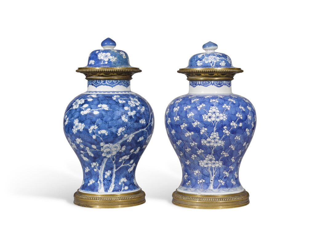 View full screen - View 1 of Lot 124. A pair of ormolu-mounted blue and white 'Hawthorn' jars and covers, Qing dynasty, Kangxi period | 清康熙 青花梅紋將軍蓋罐一對.