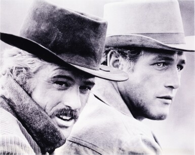 View full screen - View 1 of Lot 90. "Butch Cassidy and the Sundance Kid" | Photograph of Paul Newman and Robert Redford on set.