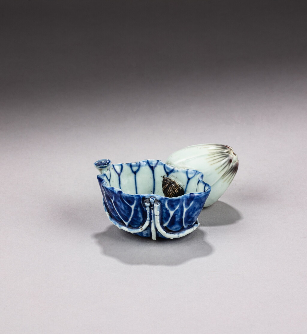 View full screen - View 1 of Lot 18. A blue and white ‘lotus’ washer and water dropper, Qing dynasty, 17th century | 清十七世紀 青花荷葉式洗水滴.