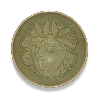 View full screen - View 1 of Lot 210. A Yaozhou carved 'lotus' bowl, Northern Song dynasty | 北宋 耀州窰青釉刻纏枝蓮紋盌.