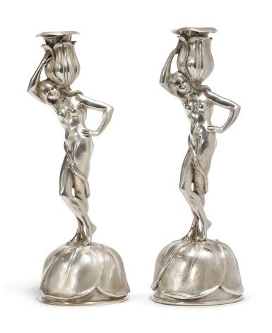 View full screen - View 1 of Lot 452. A Pair of French Silver Figural Candlesticks, Christofle, Paris, Late 20th Century.