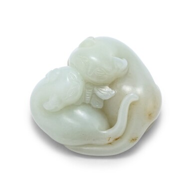 View full screen - View 1 of Lot 217. Groupe en jade celadon pale sculpté 'chats et papillon' Dynastie Qing | 清 青白玉貓蝶把件 | A pale celadon jade 'two cats and butterfly' carving, Qing Dynasty.