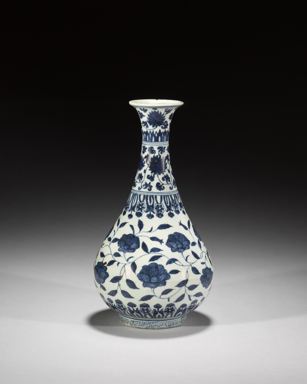View full screen - View 1 of Lot 152. A blue and white 'floral' Yuhuchunping, Mark and period of Jiajing | 明嘉靖 青花纏枝花卉紋玉壺春瓶 《嘉靖年製》款.