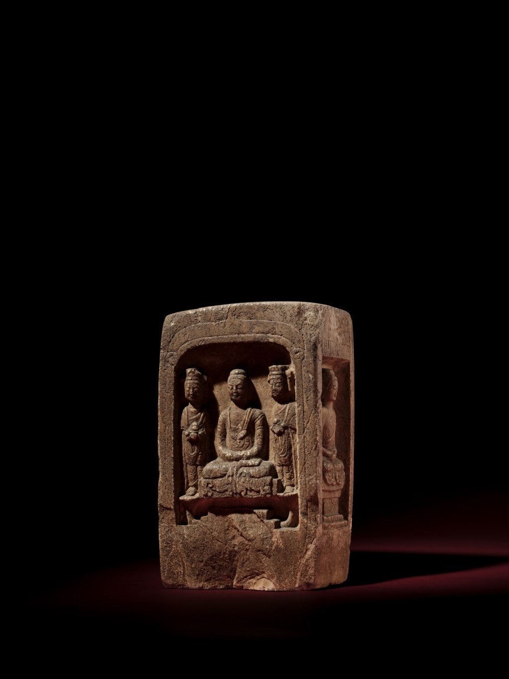 View full screen - View 1 of Lot 326. An inscribed four-sided stone stele with Buddhist triad, Northern Qi dynasty | 北齊 石雕刻銘四面龕像.