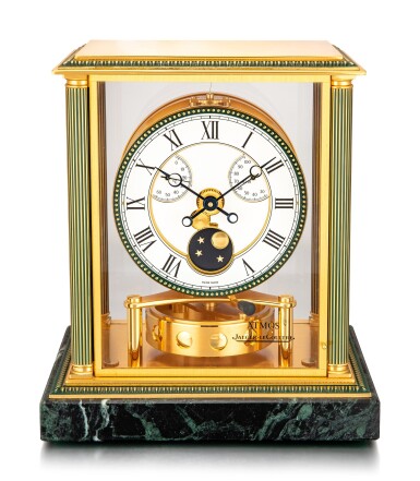 View full screen - View 1 of Lot 8053. JAEGER-LECOULTRE | A GILT BRASS ATMOS CLOCK WITH MOON PHASES, HYGROMETER, THERMOMETER AND MARBLE STAND, CIRCA 2000 | 積家 | 鍍金銅製空氣鍾,備月相、濕度計、溫度計及大理石底座,約1997年製.