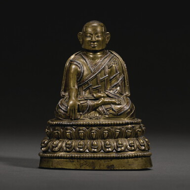 View full screen - View 1 of Lot 149. A SILVER AND COPPER-INLAID COPPER-ALLOY FIGURE OF SANGYE YARJON, TIBET, 13TH/14TH CENTURY | 十三/十四世紀 藏傳銅錯銀桑傑雅俊坐像.