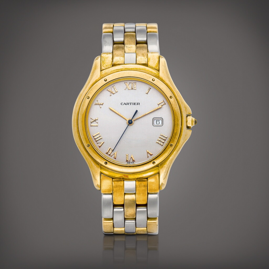 View full screen - View 1 of Lot 845. Cougar, Reference 887904C | A yellow gold and stainless steel wristwatch with date and bracelet, Circa 1995 | 卡地亞 | Cougar 型號887904C | 黃金及精鋼鏈帶腕錶,備日期顯示,約1995年製.