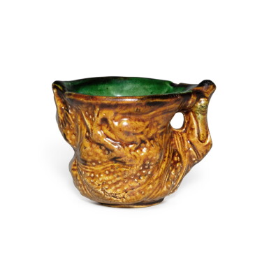 View full screen - View 1 of Lot 167. An amber- and green-glazed pottery cup, Tang dynasty | 唐 三彩模印樹樁式小盃.