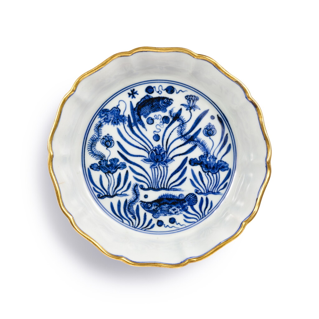 View full screen - View 1 of Lot 3688. A superbly painted and extremely rare blue and white 'fish pond' brush washer, Mark and period of Xuande | 明宣德 青花魚藻紋葵花式洗 《大明宣德年製》款.