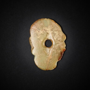 View full screen - View 1 of Lot 3779. A yellowish-celadon jade 'human head' pendant, Neolithic period | 新石器時代 青黃玉人頭珮.