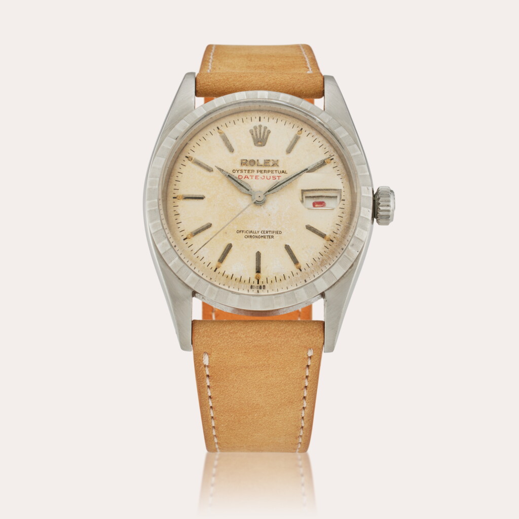View full screen - View 1 of Lot 314. Reference 6305 2 Datejust | A stainless steel automatic wristwatch with date, engine turned bezel, and red date wheel, Circa 1952.