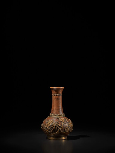 View full screen - View 1 of Lot 129. A small parcel-gilt bronze 'three friends of winter' bottle vase, 17th century | 十七世紀 銅局部鎏金歲寒三友圖小長頸瓶.