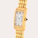 Tank Américaine, Reference 811904 | A yellow gold wristwatch with date and bracelet | Circa 2000