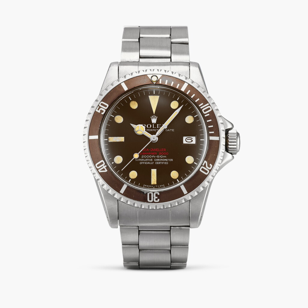 View full screen - View 1 of Lot 2129. ‘Double Red’ Sea-Dweller “Tropical MK II”, Reference 1665 | A stainless steel wristwatch with date, bracelet and tropical dial, Circa 1972.