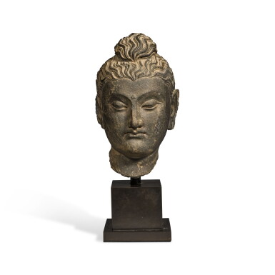 View full screen - View 1 of Lot 116. A grey schist head of Buddha, Ancient Region of Gandhara, circa 3rd Century.