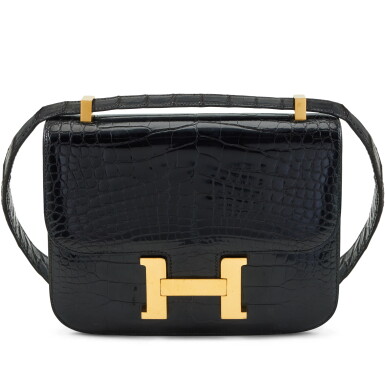 View full screen - View 1 of Lot 133. Vintage Black Shiny Mississippiensis Alligator Constance 23 Gold Hardware, 1990's.